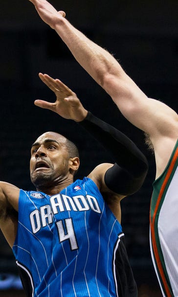 Knight scores 18 with sore foot, Bucks beat Magic